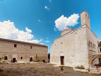 Low angle view of historic building against sky