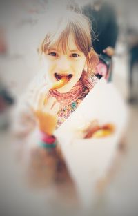 Portrait of girl eating ice cream