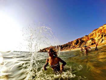 People enjoying in sea