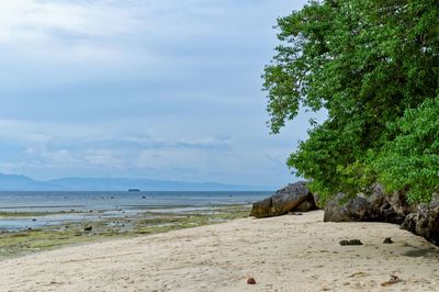 Scenic view of sea against cloudy sky