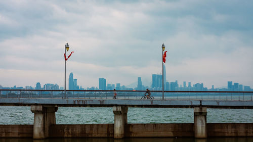 Pier over sea against sky