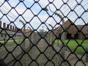 Auschwitz concentrate camp in poland. shooting through fence.