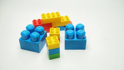 Close-up of toys against white background