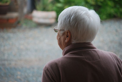 Rear view of woman looking away