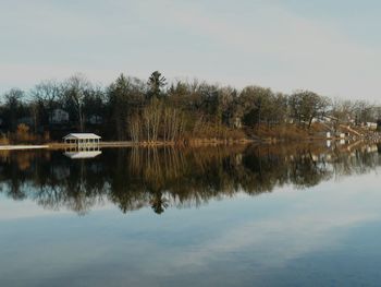 Reflection of trees in calm lake