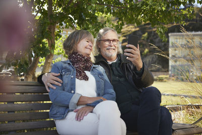 Mature couple taking selfie