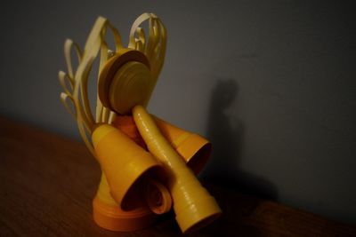 Close-up of yellow toy on table