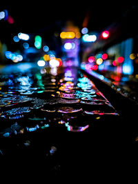 Defocused image of illuminated lights at night