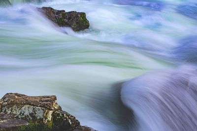 Long exposure scenic view of waterfall