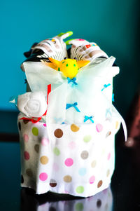 Close-up of multi colored diaper cake