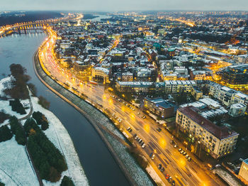 High angle view of light trails on road at night