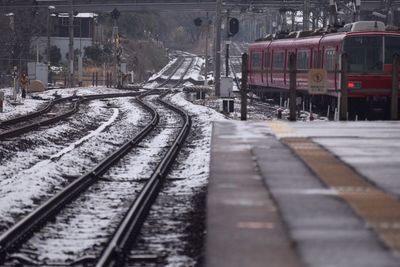 Train on railroad tracks during winter