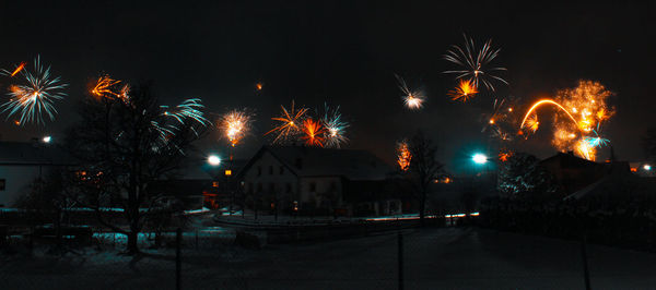 Firework display at night