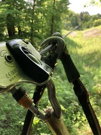 Close-up of bicycle on field