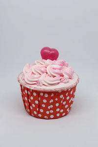 Close-up of cake against white background