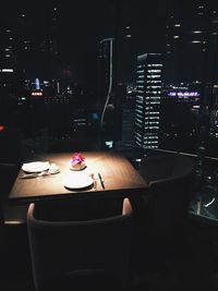 Table and chairs at night