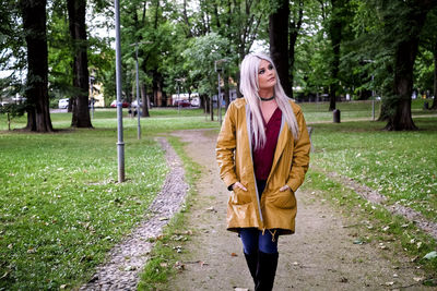 Full length of woman standing in park