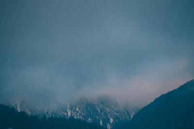 Scenic view of mountains against sky during winter