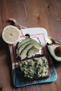 High angle view of fruits in plate on table