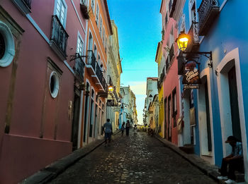 Street amidst residential buildings