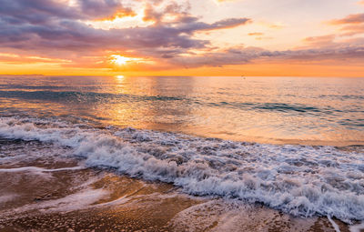 Dreamlike sunrise at the sea with beautiful clouds mood