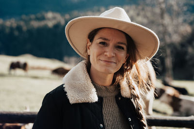 Portrait of woman wearing hat