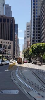 City street and modern buildings against sky