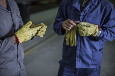 Close-up of factory worker's hands