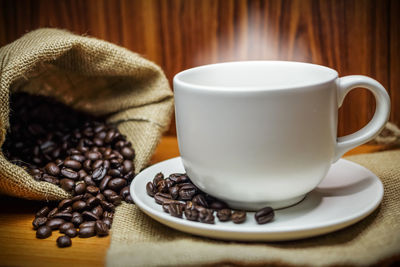 Close-up of coffee cup on table