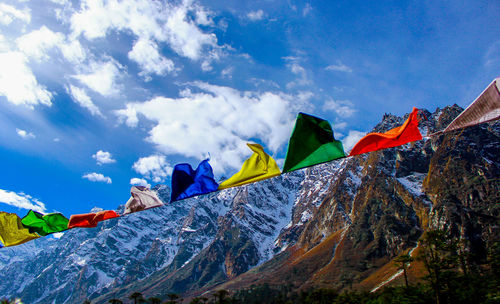 Colorful flags and mountain