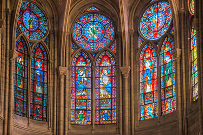 Beautiful vitrages stained glass windows of cathedral notre-dame de paris before fire april 15, 2019