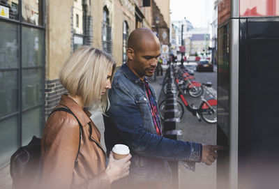 Couple kissing in city