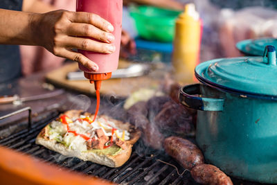 Close-up of person preparing food