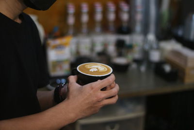 Man holding coffee