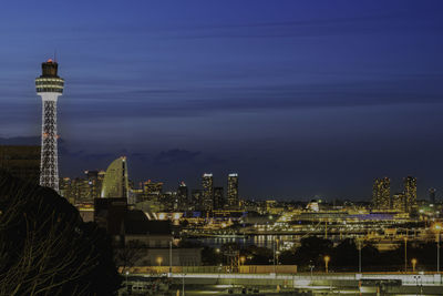 Illuminated buildings in city at night