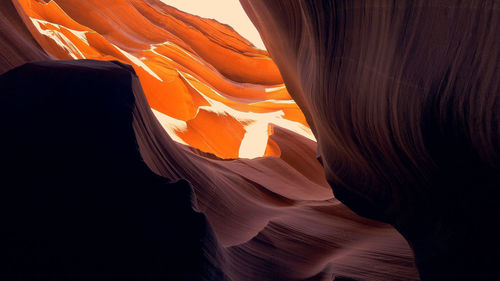 Close-up of rock formation against sky