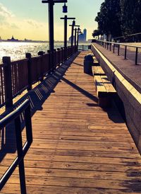 Pier over sea against sky