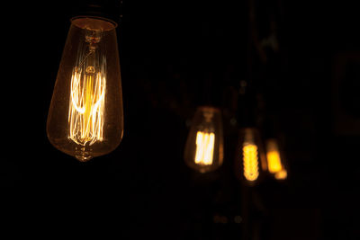 Close-up of illuminated light bulb