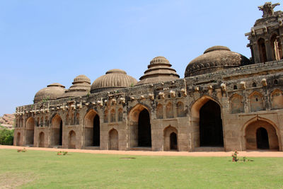 Ancient temple against clear sky