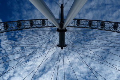 Low angle view of ferris wheel against sky