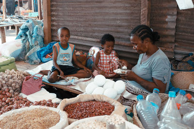 High angle view of people sitting at market