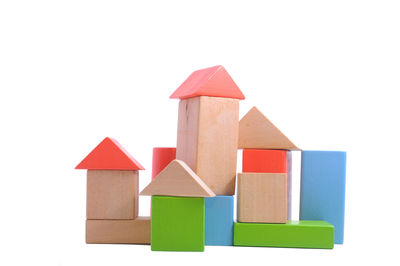 Stack of red toy against white background