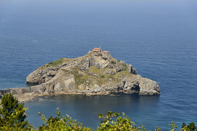 High angle view of rock formation in sea