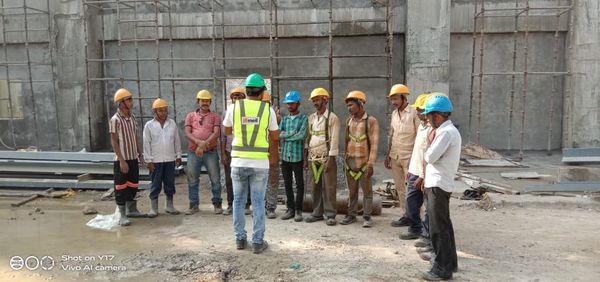 Group of people working at construction site