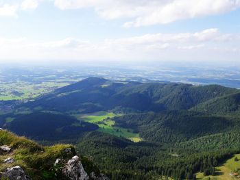 High angle view of landscape with mountain range in background