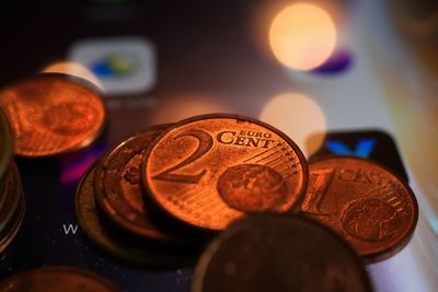 Close-up of coins on table