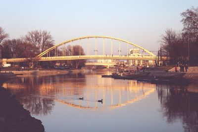 Bridge over river against sky