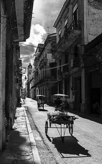 Street in city against sky