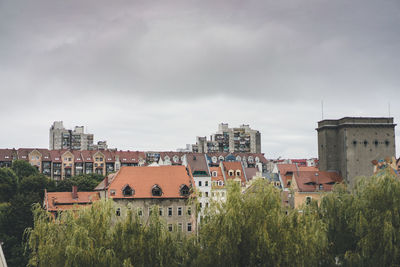 Buildings in city against sky