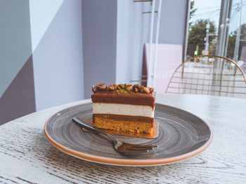 Close-up of cake served on table